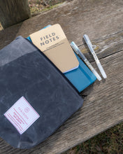Load image into Gallery viewer, large gray waxed canvas pouch with notebooks