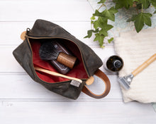 Load image into Gallery viewer, open waxed canvas dopp kit with toiletries