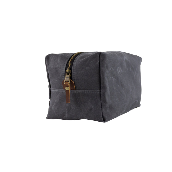 gray waxed canvas dopp kit with vegetable leather accents - side view