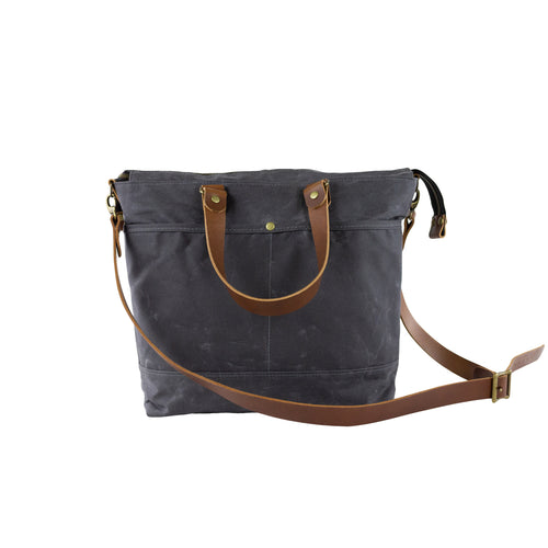 gray waxed canvas crossbody bag with vegetable leather details and straps