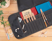Load image into Gallery viewer, large artist roll with notebooks and pencils
