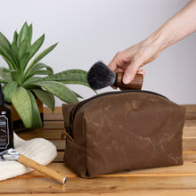 Load image into Gallery viewer, large tan waxed canvas dopp kit with toiletries
