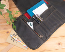 Load image into Gallery viewer, pen roll case with notebooks and pens
